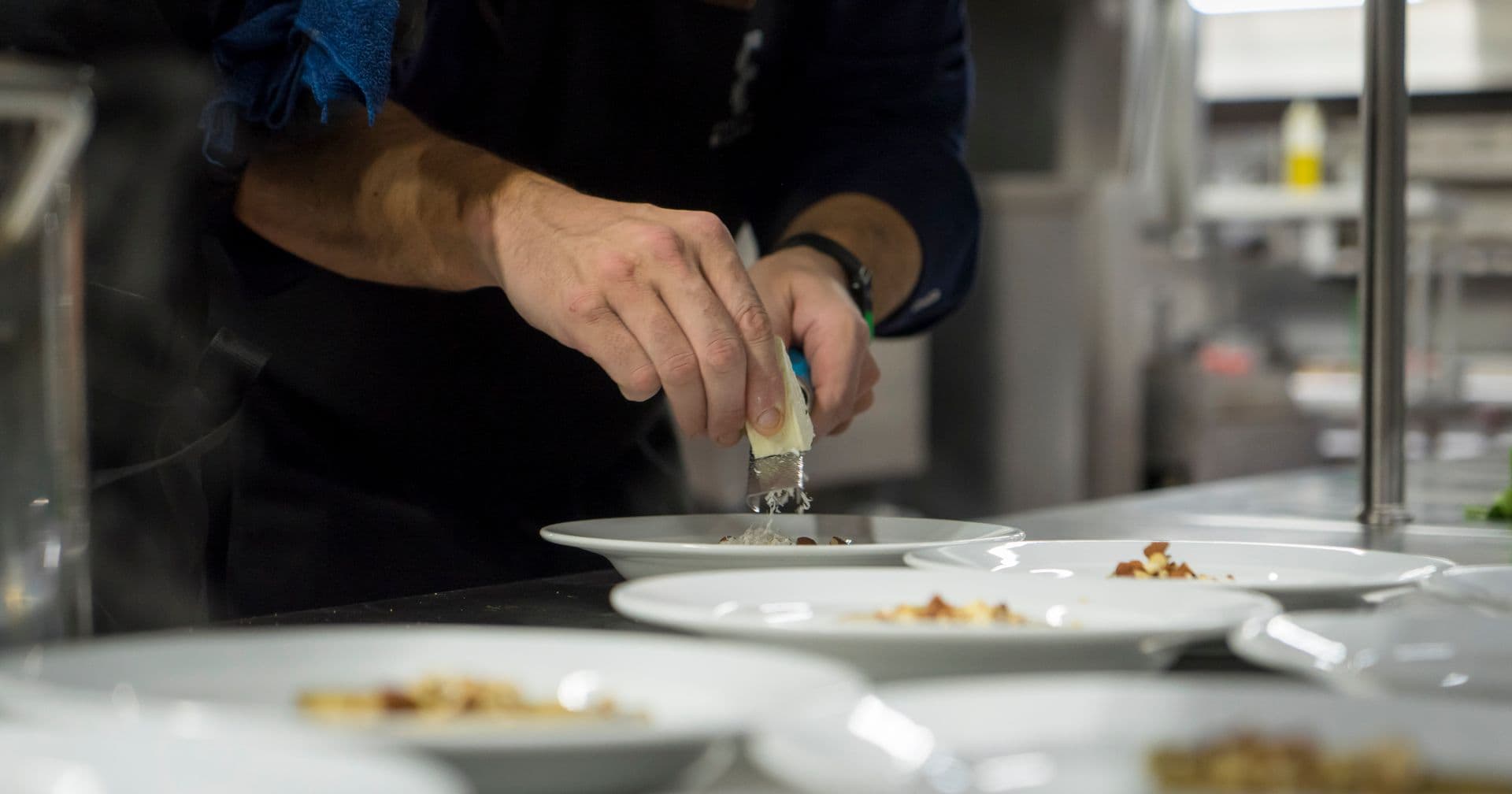 A chef carefully plating a gourmet dish — like high-quality, well-crafted web content