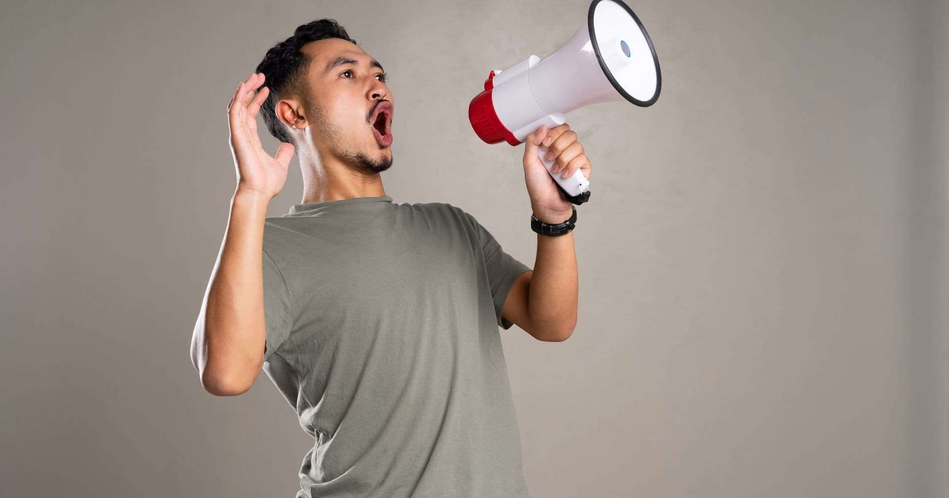 A bright megaphone broadcasting reactions — like an active, shared social media presence