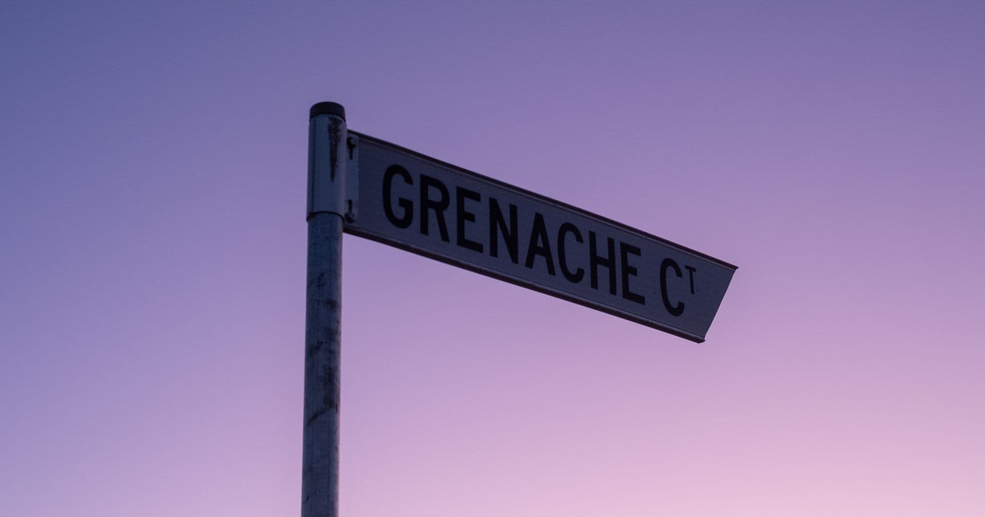 Clean, clearly labelled street signs pointing the way — like a readable, well-structured URL